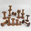 Retro Solid Wood Spool: Nostalgic Handmade Thread Organizer for Cross-Stitch and Crafting.