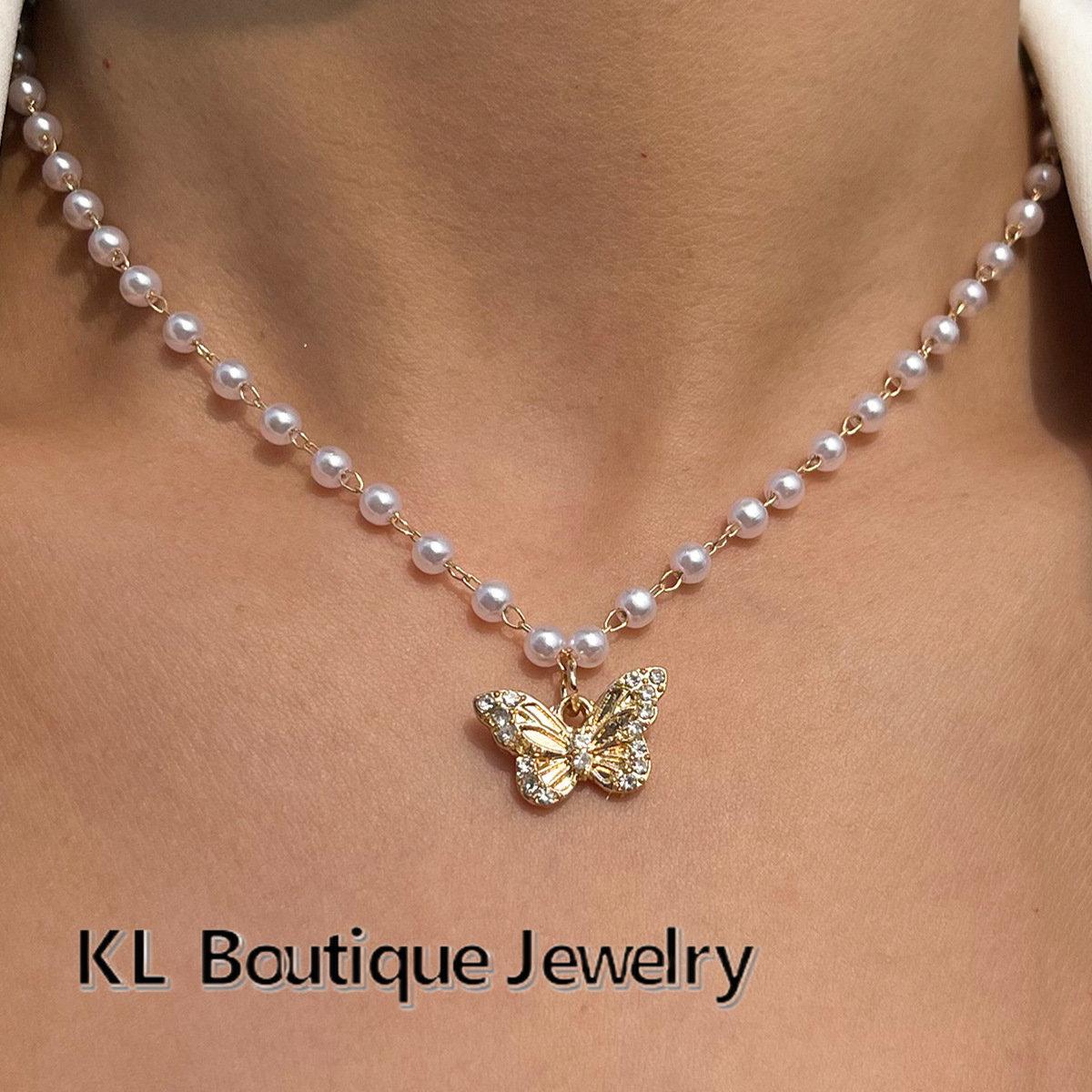 

Золотое ожерелье Дамское маленькое свежее кулон бабочка с жемчужными украшениями на ключицах