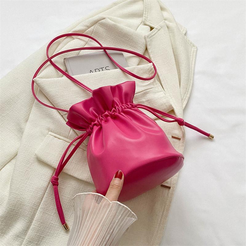 Fashionable Simple Bucket Bag For Women With Soft Structure Available In Black White Brown And Fuchsia