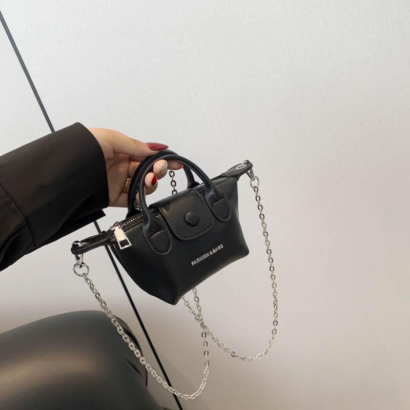 

Корейская версия мини-сумки для пельменей 2024 года, новая летняя сумка, простая и милая сумка через плечо, маленькая свежая сумка-мессенджер для женщин чёрный