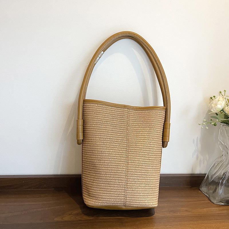 Stylish and Simple Woven Portable Bucket Bag Women's Autumn and Winter New High-end Seaside Vacation Shoulder Bag