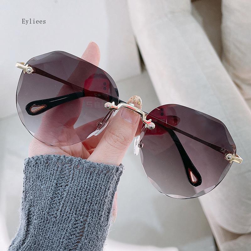 Rimless Sunglasses Women'S Retro Metallic Sun Glasses Uv Protection New Fashion Cutting Lens Eyewear Uv400 Sun Glasses