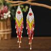 Bohemian Long Tassel Earrings: Elegant Handmade Korean-Style Woven Seed Bead Design for Women.