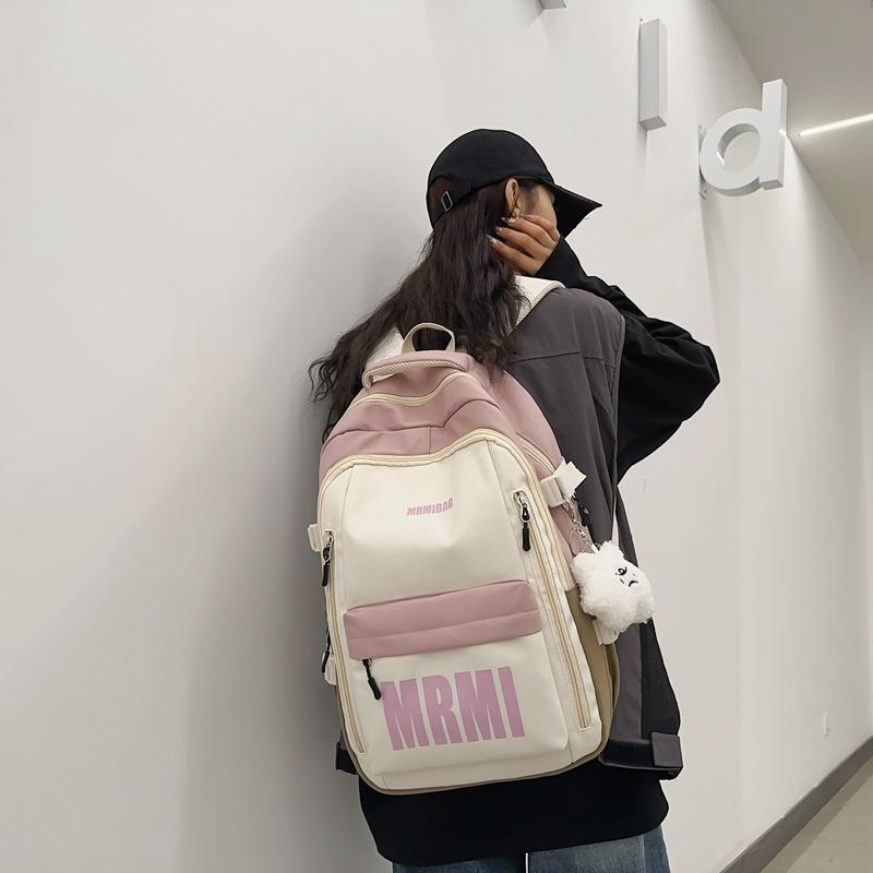 Harajuku ins printed alphabet student schoolbag Korean version casual large-capacity junior high school student backpack