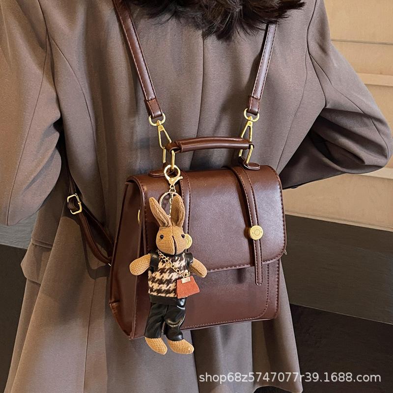 Niche high-end retro buckle backpack 2025 new crossbody British commuter student three types of backpack