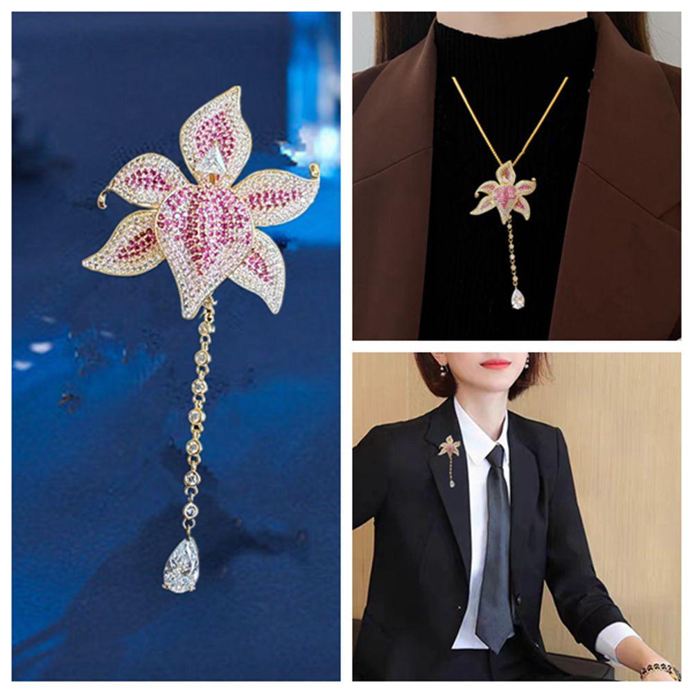 

Брошь Лилия Циркон: Элегантный женский модный аксессуар в стиле легкой роскоши