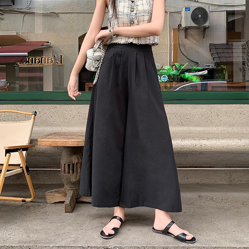 

Thin wide-leg pants ice silk medium and long skirt pants women s summer new high-waisted and thin casual seven-point loose trousers skirt L чёрный
