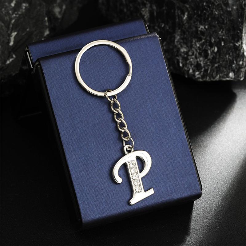 Porte-clés Mode Alphabet A-Z Charms Lettre Tendance Créatif Porte-clés 26 Initiales Pendentif Accessoires de Décoration de Sac à Dos Cadeau