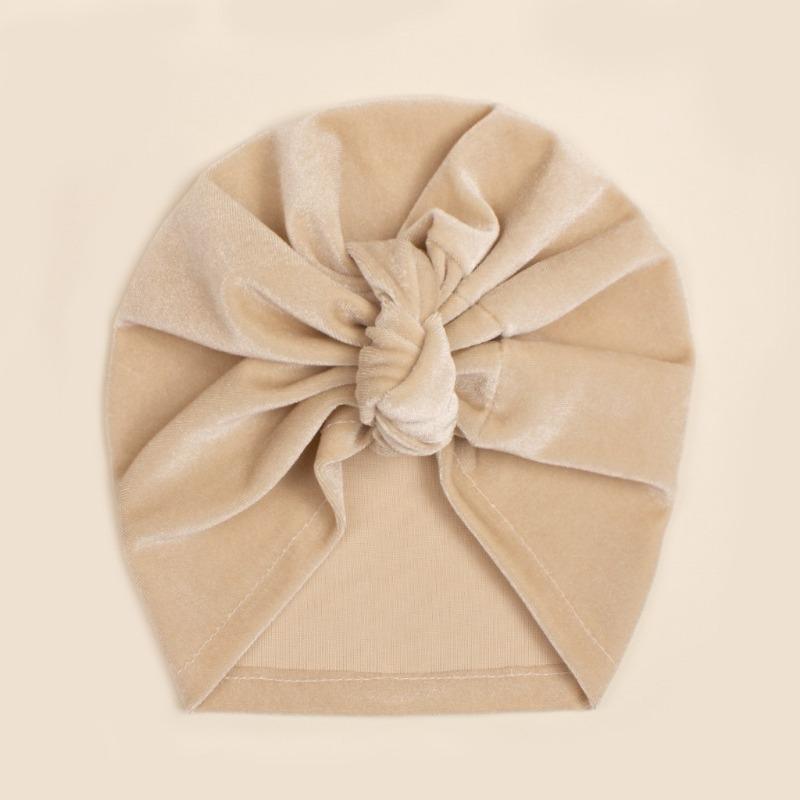 

Autumn baby solid color golden velvet knotted hat, children s soft and delicate pullover hat, baby hat