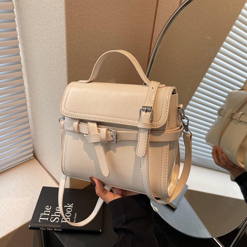 Retro liten väska dam mångsidig ny mode axelbudväska dam bärbar jobb liten väska