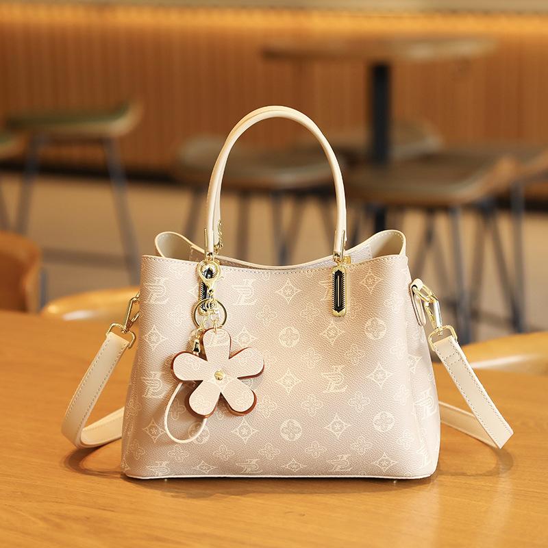 

Atmospheric light luxury portable women s bag fashionable versatile niche shoulder bag printing high-end texture messenger tote bag