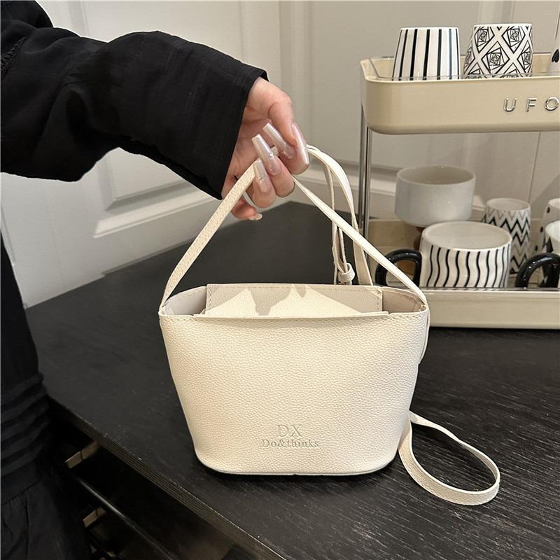 Frühling und Sommer beliebt einfache einfarbige Umhängetasche neue modische vielseitige High-Sense Schulter-Eimer-Henkeltasche Damen