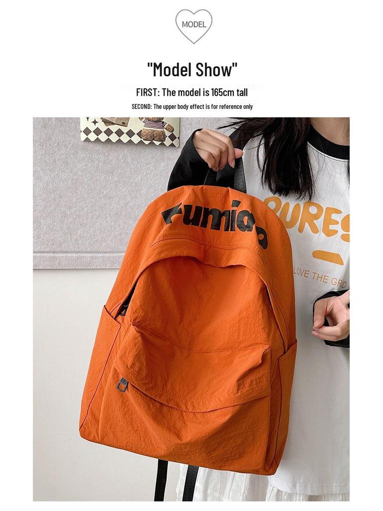 Lightweight Minimalist Backpack for Female Students: Versatile Double-Shoulder Bag for School and Travel.