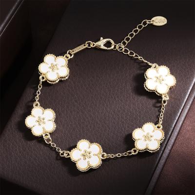 ZAKOL Marca 5 Pezzi Fiore di Prugno Braccialetti per Donne Pianta Fiore a Cinque Foglie Catena in Acciaio Inossidabile Braccialetti Zircone Regali