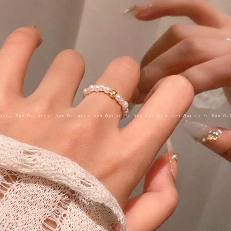 Elastic rope adjustable pearl beaded ring women's retro simple gold ball ring ring new personalized jewelry