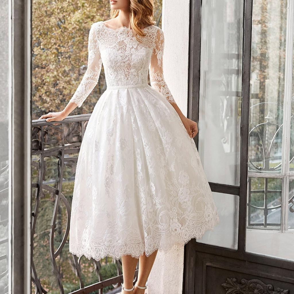 sachin and babi light blue dress Trend Report: Sexy Wedding Dresses - Photos & Advice main image 1