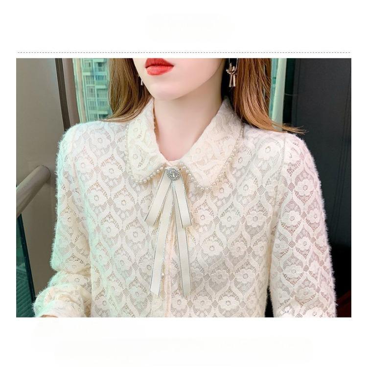 Bleiben Sie im Trend mit dieser stilvollen Spitzenbluse - Perfekt für einen anspruchsvollen Look