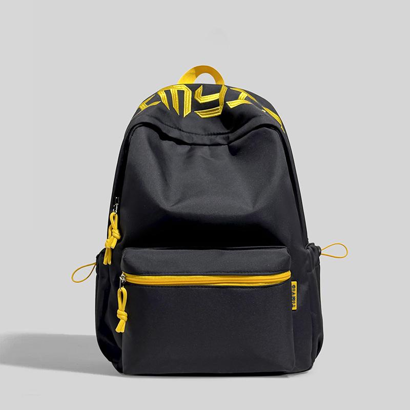 Schoolbag Japanese simple and versatile large-capacity solid color campus schoolbag 1011 summer new light commuter student backpack