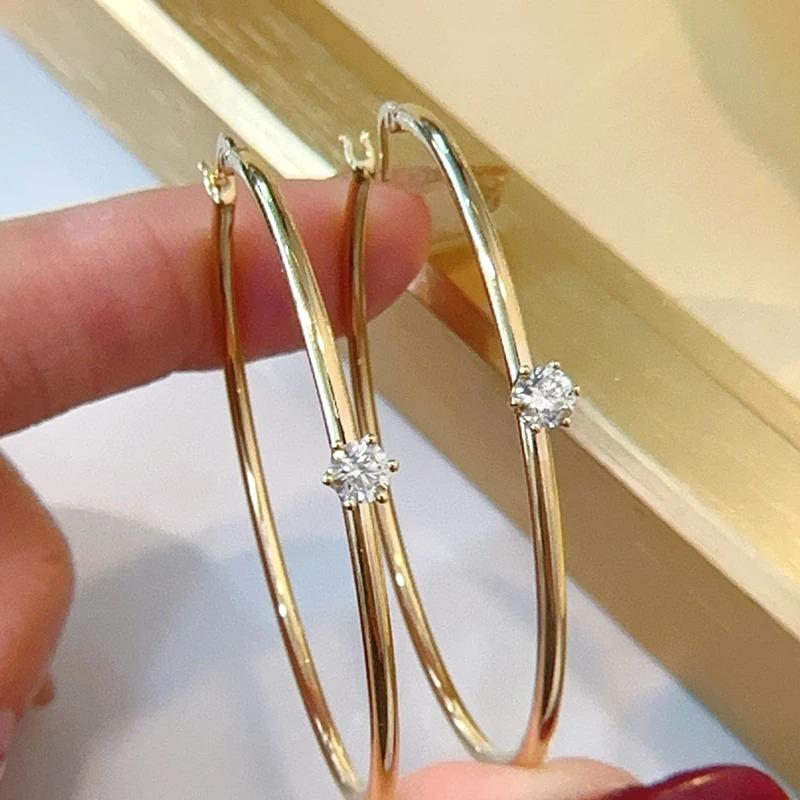 

Classic Fashion Gold Color Women s Earrings Shine Inlaid with White Zircon Hoops Earrings Woman Zircon