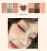 Heartbeat Twelve-Color Heart-Shaped Eyeshadow Palette: Pearlescent, Fine Glitter, Matte, Blush, Highlighter for Enhanced Complexion.