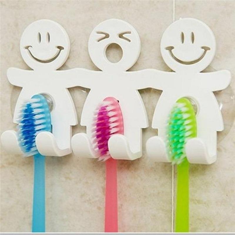 Toothbrush holder with suction cups