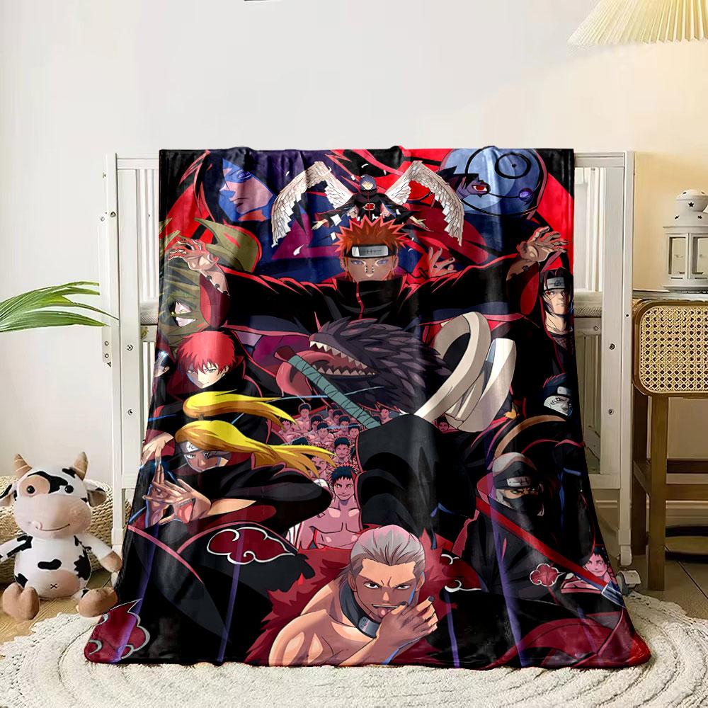 

A group of characters wearing black cloaks with red cloud motifs. for all seasons blanket lunch break throw gift 80cm x 120cm