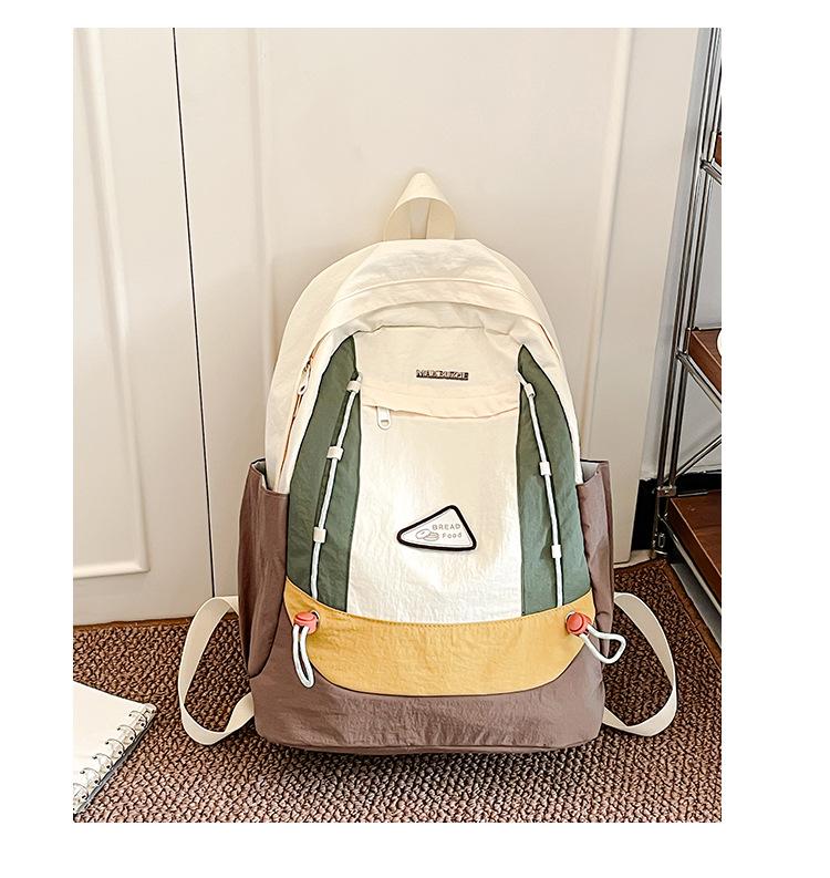 Simple schoolbag, Korean contrasting colors, new schoolbag, light travel and leisure backpack, high value, dirt-resistant