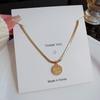 18K Gold Round Tag Titanium Steel Necklace - Light Luxury Niche Blade Chain Choker for Women's Cold Style.