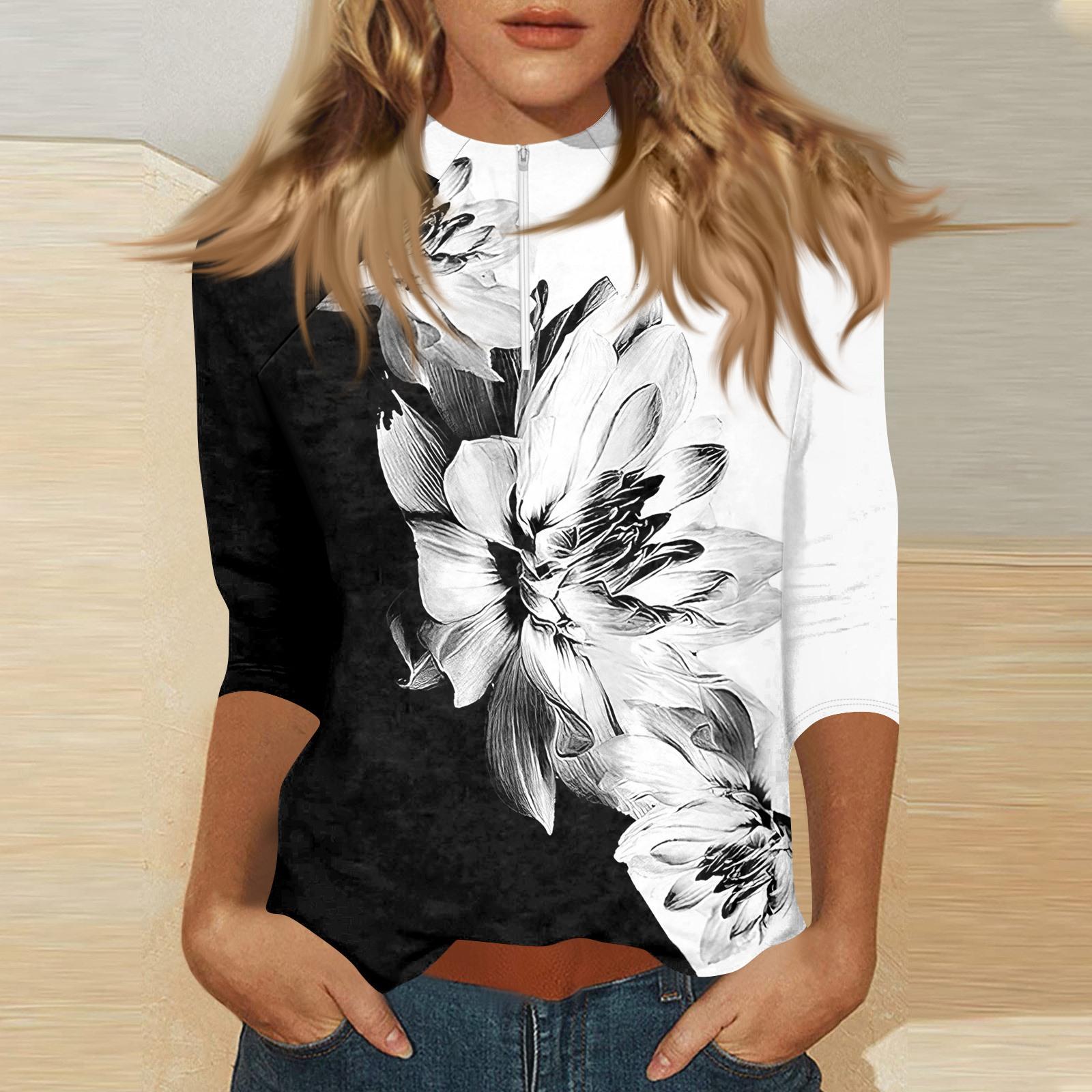 

Женский топ с принтом, рукавом 3/4 и молнией под горло M чёрный