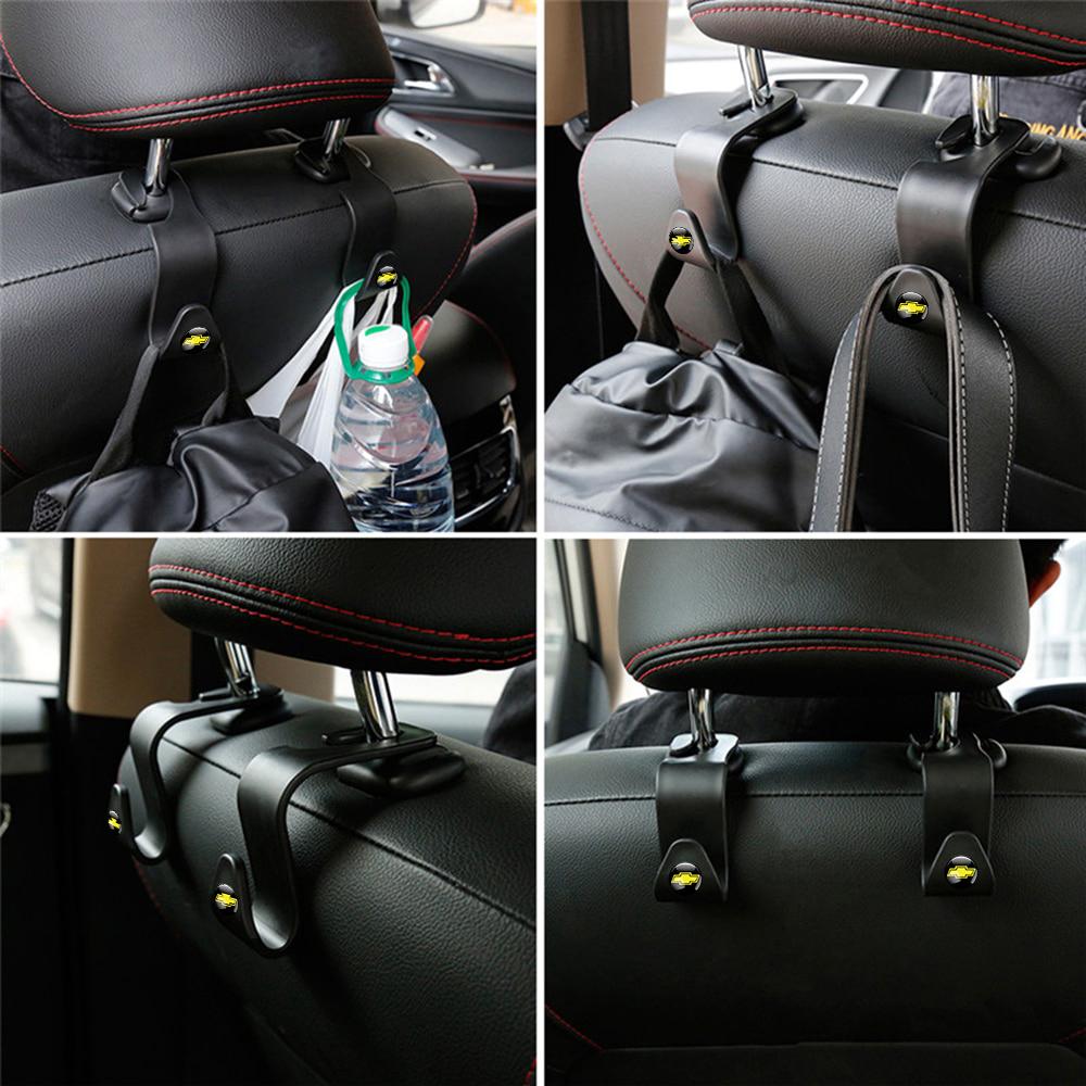2/4 szt. Stylizacja samochodu ABS Haczyk Uchwyt Klipsy do przechowywania na tylnym siedzeniu Dla Chevrolet Cruze Captiva Lacetti Aveo Malibu Trax Camaro Colorado