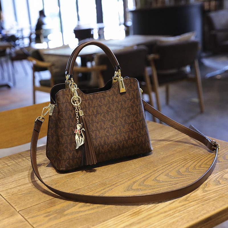 

New women s bag retro versatile printed handbag fashion letter bucket bag high-end shoulder messenger bag