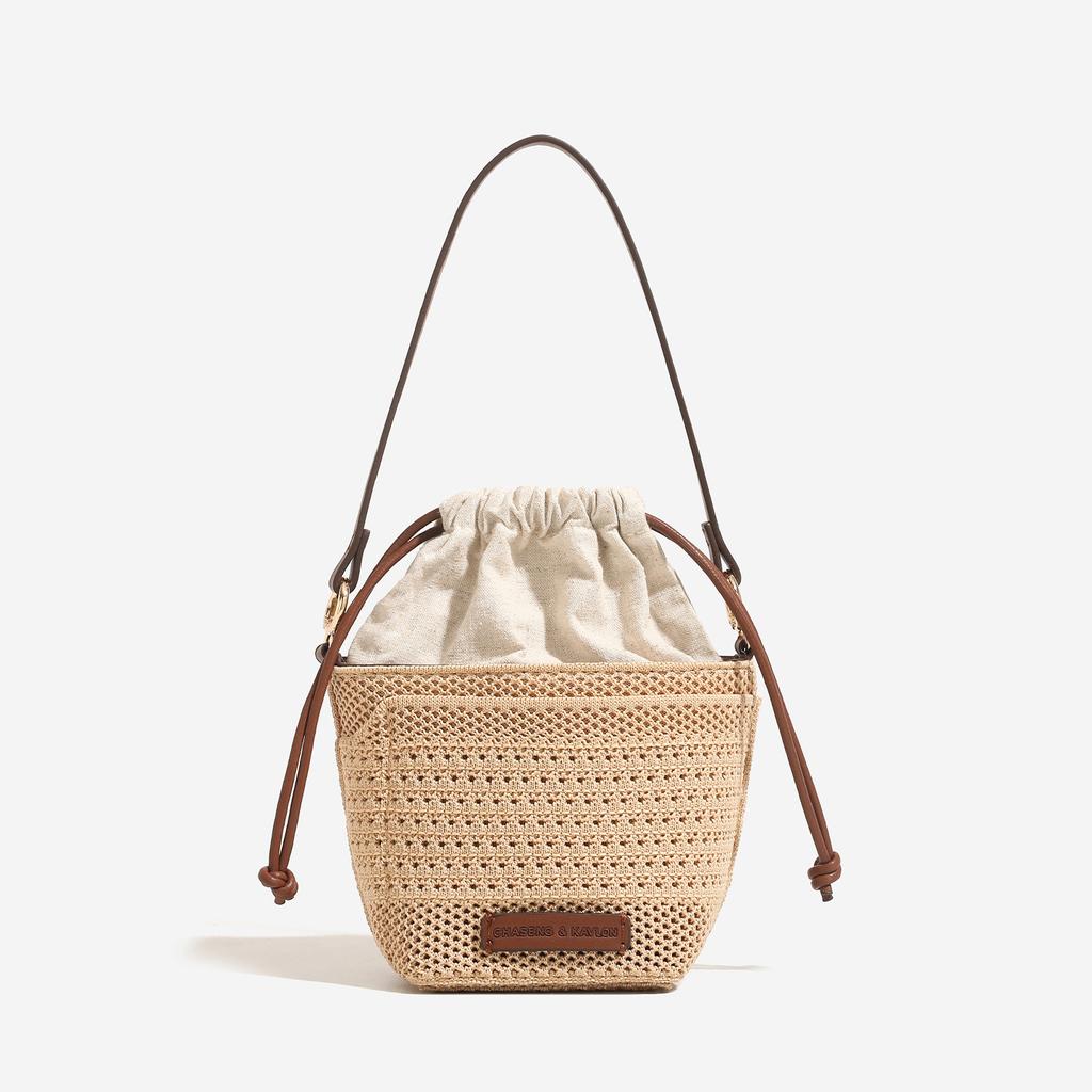 2026 spring new handheld women's bags niche high-end hand-woven beach bucket bags shoulder messenger bags