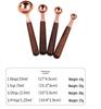 Gold-Plated Stainless Steel Measuring Cups & Spoons with Solid Wood Handles and Scale Markings for Baking.