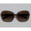 Used COACH brown round sunglasses