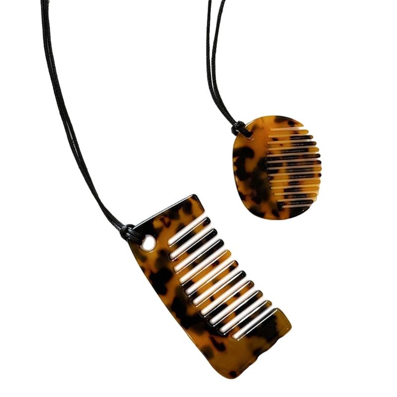 Modische Halskette mit Kammanhänger zum Stylen von Fransen. Tragbares, robustes Schmuckaccessoire aus Acryl für Damen und Herren im täglichen Gebrauch.