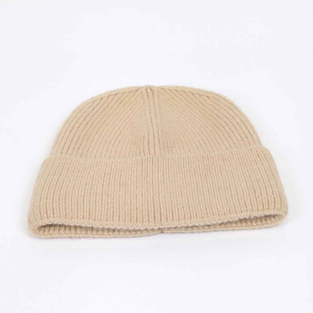 Wool hat women's autumn and winter simple solid color warm hemming thickened pullover cold hat men's knitted hat