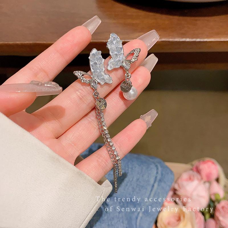 Asymmetrical butterfly pearl fringed earrings women s new light luxury temperament high-end earrings silver needle ear jewelry