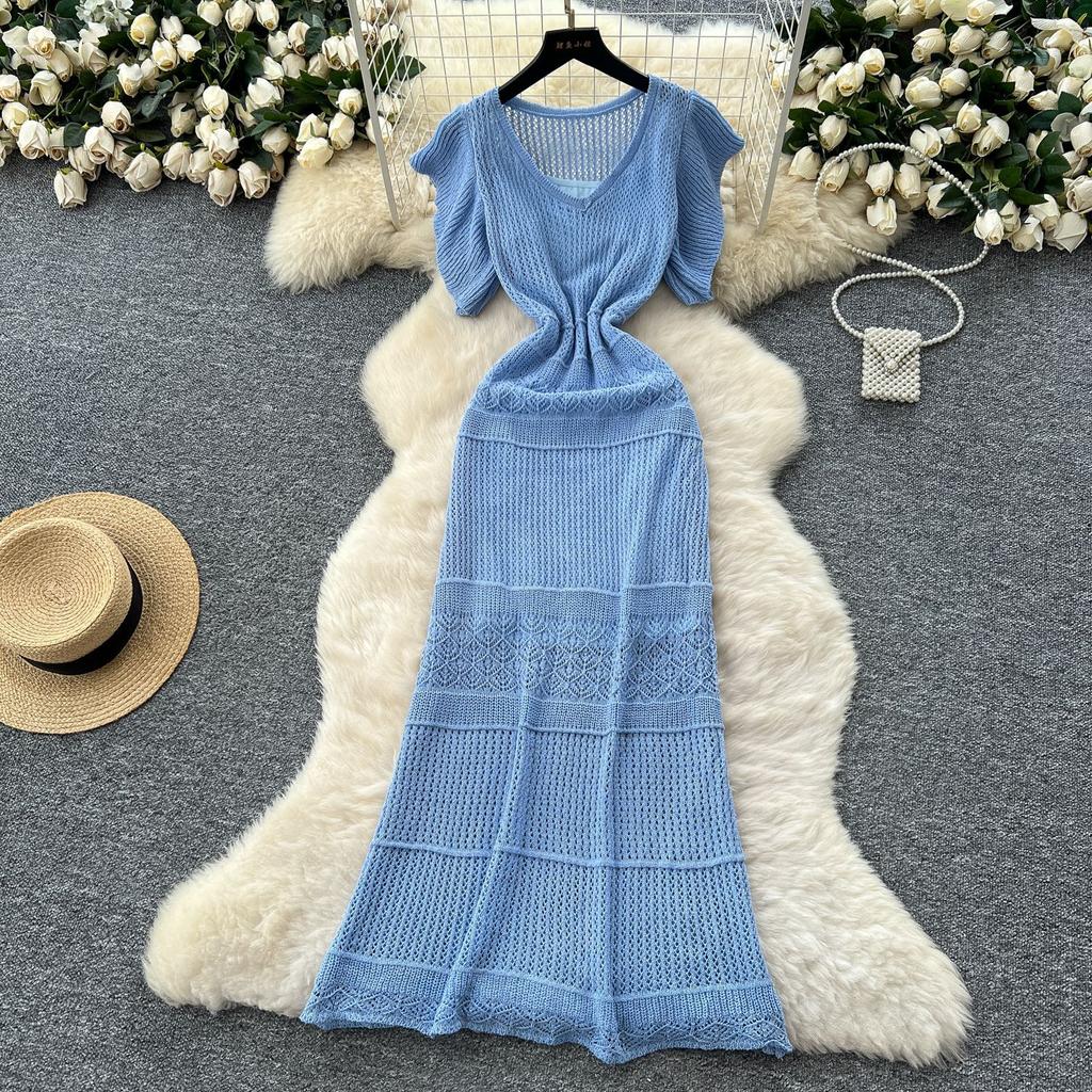 Wear women's high-end sense hollow crochet waist small fly sleeve knitted dress with suspender skirt two-piece set