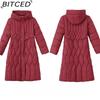 BITCED Women's Long-Length Winter Coat with Hood and Drawstring Waistband Fitted and Flattering Silhouette for a Slimming Effect