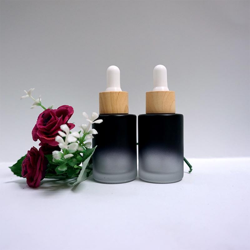 30ML Matte Frosted Black Glass Liquid Essential Oil Perfume Bottle with Reagent Dropper and Wood Grain Cap Packing Bottles