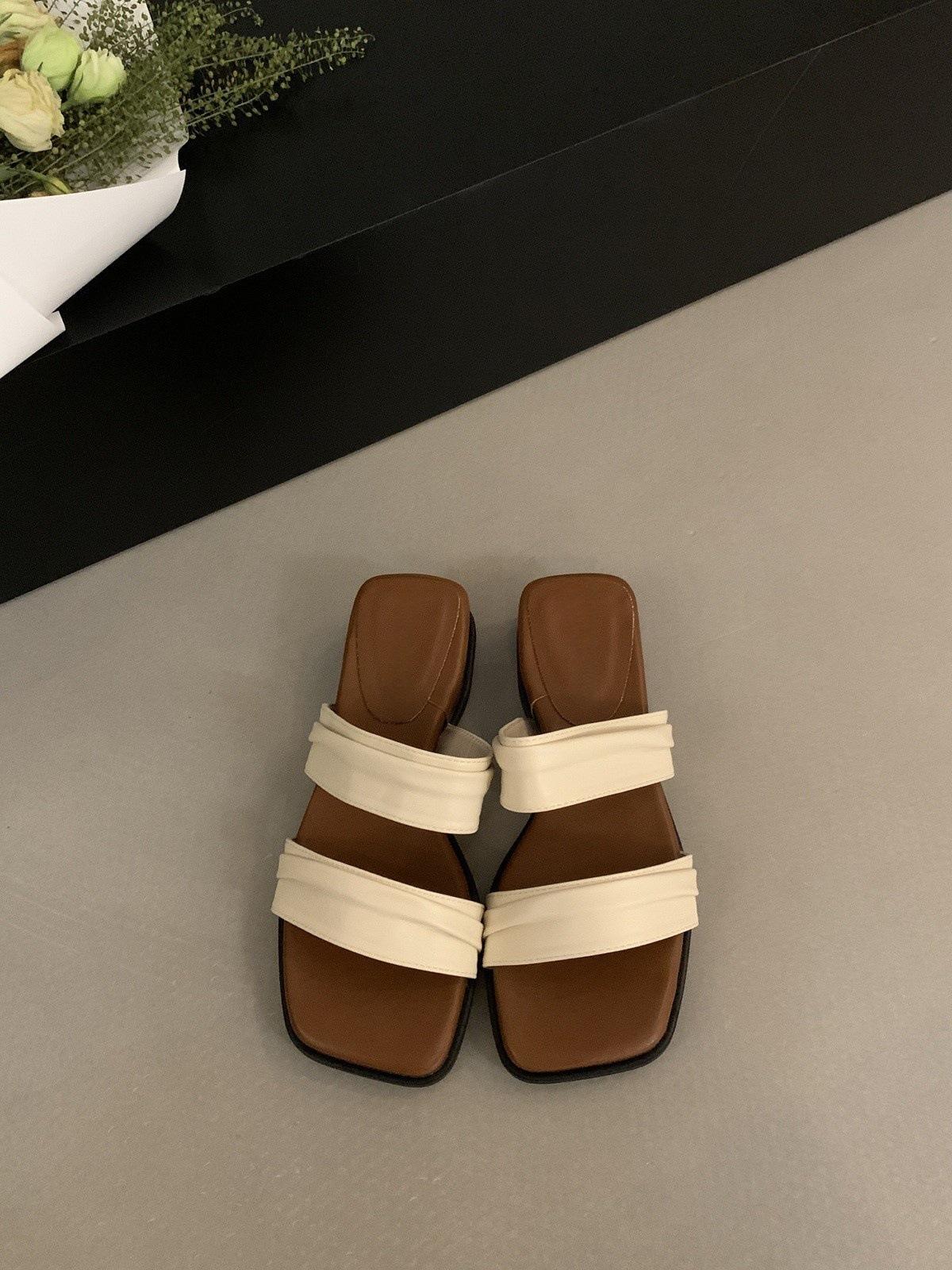 

Thick-soled one-word slippers women s shoes wear 2025 new summer slope heel sandals fairy wind beach vacation sandals 40