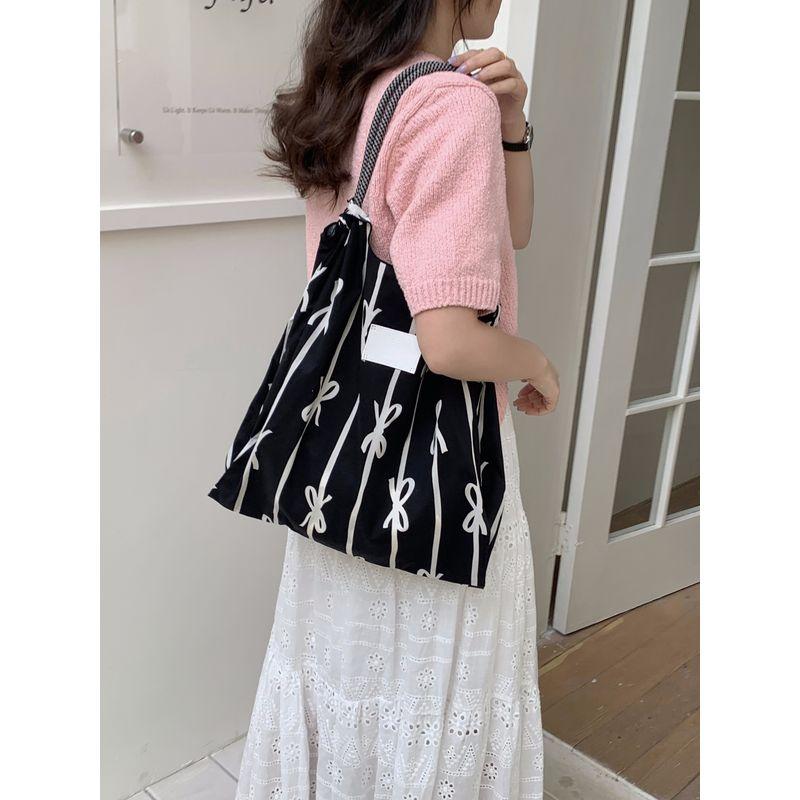 

Huridom Floral Large Capacity Cloth Bag Black Bows