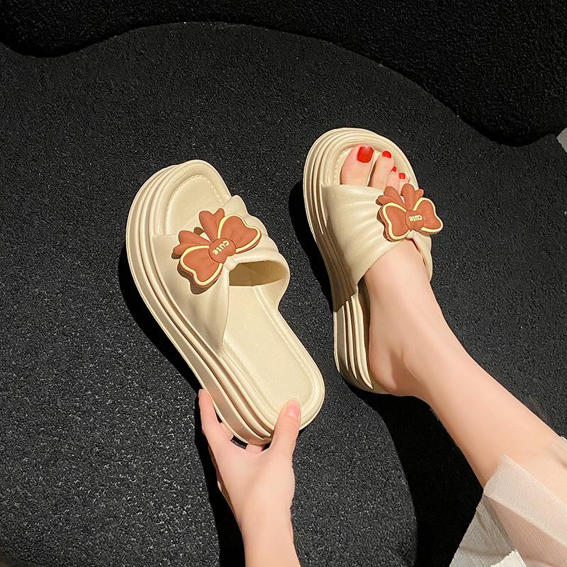 Slippers women's new thick-soled heightened non-slip summer outer wear indoor new EVA thick-soled muffin shoes comfortable one-word drag