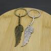 Schmuck, Minimalistischer Feder-Schlüsselanhänger-Anhänger