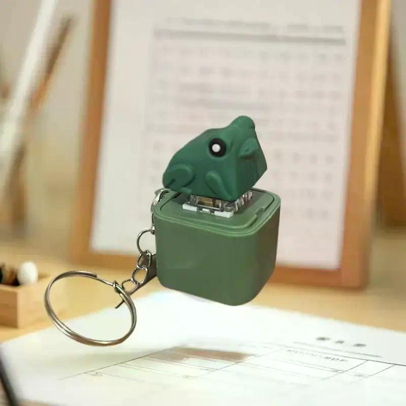 Lustiger Quakende Frosch Ente Schlüsselanhänger Wiederaufladbare Tastatur Fidget Klicker Sound Schlüsselanhänger Mit LED-Licht Zum Stressabbau