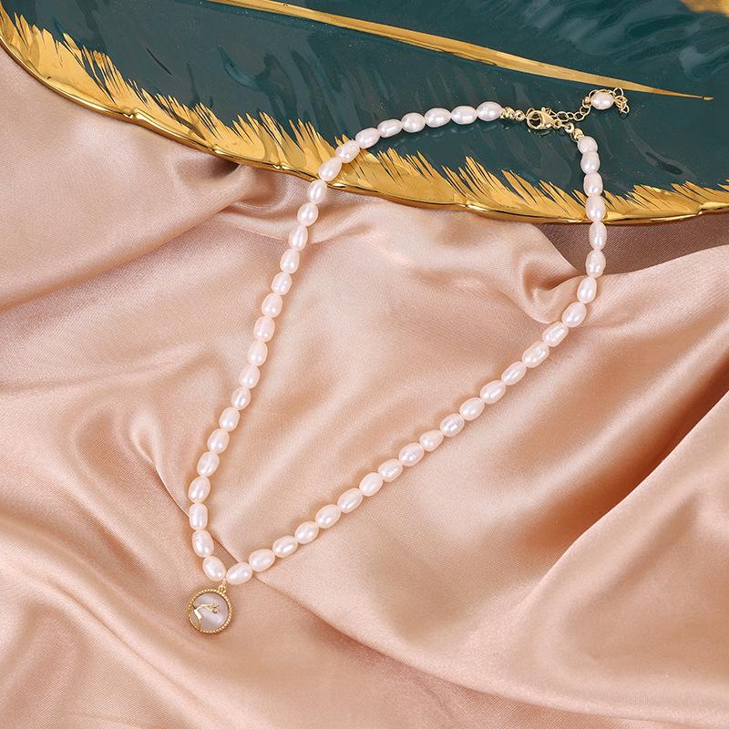 

Oval freshwater pearl necklace smiley face deer pendant pearl neck chain niche design high-end sweater chain