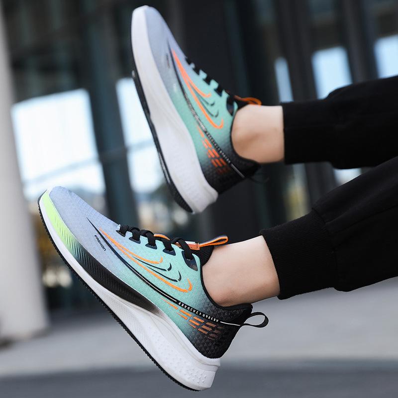 Sapatos esportivos e de lazer Sapatos de moda versátil popular masculinos tecidos voadores respiráveis primavera e verão novos sapatos de maré estudantis sapatos de corrida