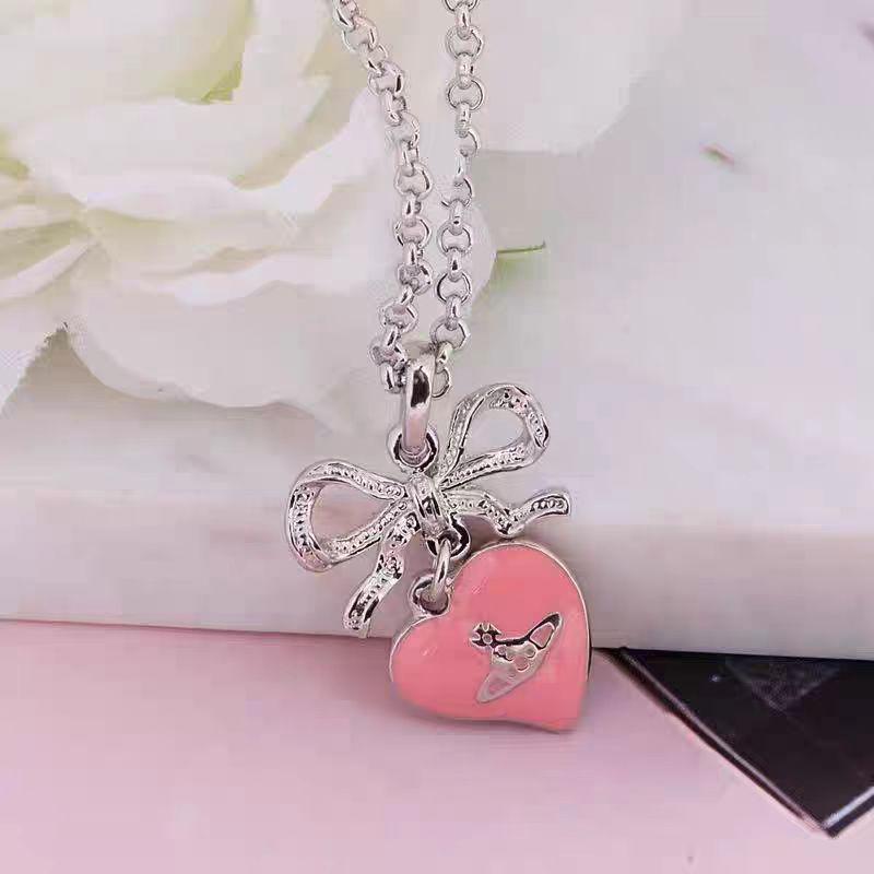 Empress Cixi Pink Bow Lacquered Saturn Necklace: Luxurious Punk-Style Clavicle Chain for Women