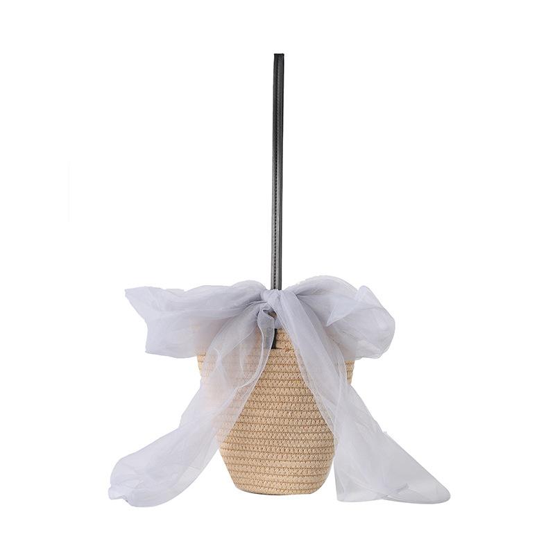 

New spring and summer fresh and fashionable straw bag bow cotton rope woven bag travel photography shoulder women s bag