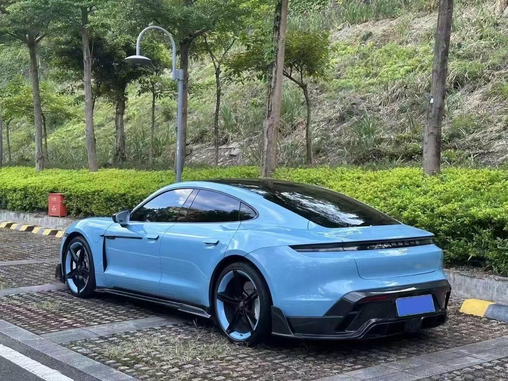 Taycan Mansory-Style Carbon Fiber Body Kit: Front Lip, Side Skirts, Rear Lip, Tail Wing, Wind Deflectors.